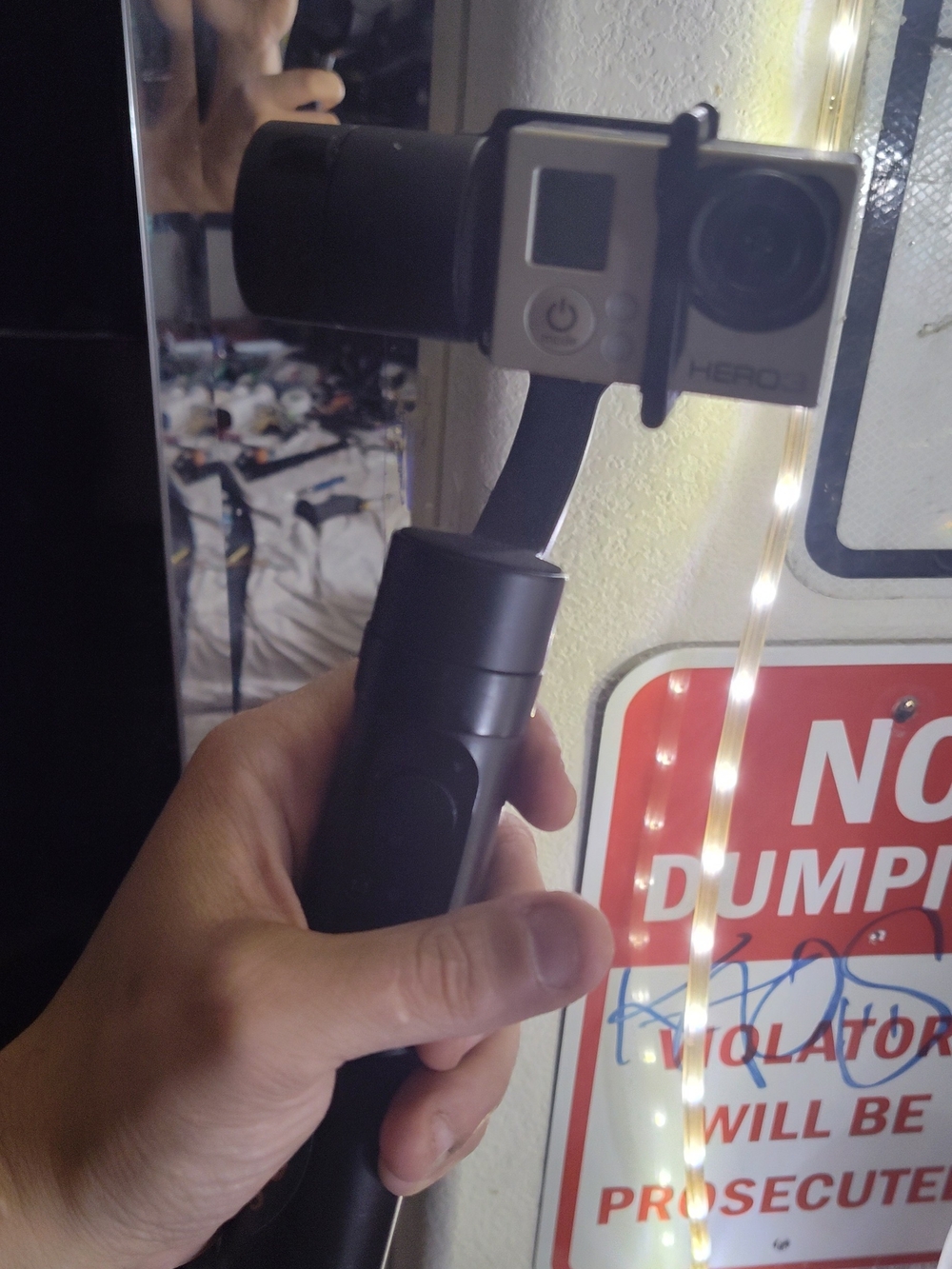 GoPro Silver and Black HERO3 on Yi Black Handheld Gimbal